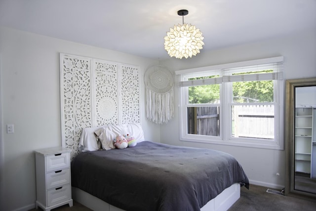 1703 Beverly Pl, Highland Park, IL 60035 - bedroom featuring dark carpet and baseboards