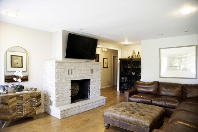 1703 Beverly Pl, Highland Park, IL 60035 - living area with a stone fireplace and wood finished floors