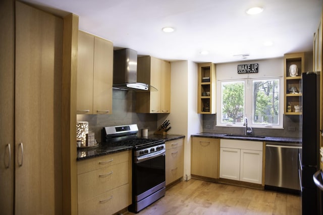 1703 Beverly Pl, Highland Park, IL 60035 - kitchen with appliances with stainless steel finishes, wall chimney exhaust hood, a sink, backsplash, and light wood-type flooring
