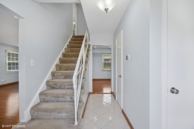 751 Essington Ln, Buffalo Grove, IL 60089 - stairs featuring baseboards and tile patterned flooring