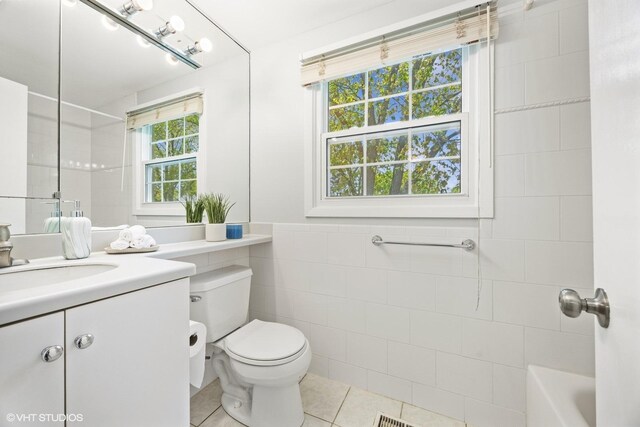 751 Essington Ln, Buffalo Grove, IL 60089 - full bathroom with tile patterned floors, tile walls, toilet, and vanity