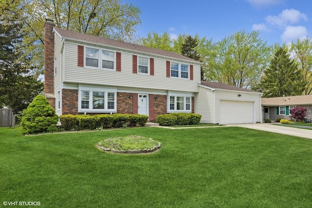 751 Essington Ln, Buffalo Grove, IL 60089 - colonial home featuring a chimney, a garage, driveway, and a front yard