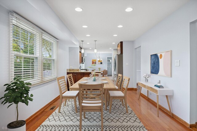 751 Essington Ln, Buffalo Grove, IL 60089 - dining room with light wood-type flooring, recessed lighting, and baseboards