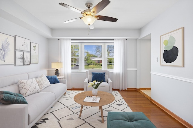 751 Essington Ln, Buffalo Grove, IL 60089 - living area with wood finished floors, baseboards, and a ceiling fan