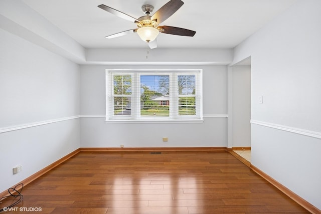 751 Essington Ln, Buffalo Grove, IL 60089 - unfurnished room featuring wood finished floors, a ceiling fan, and baseboards