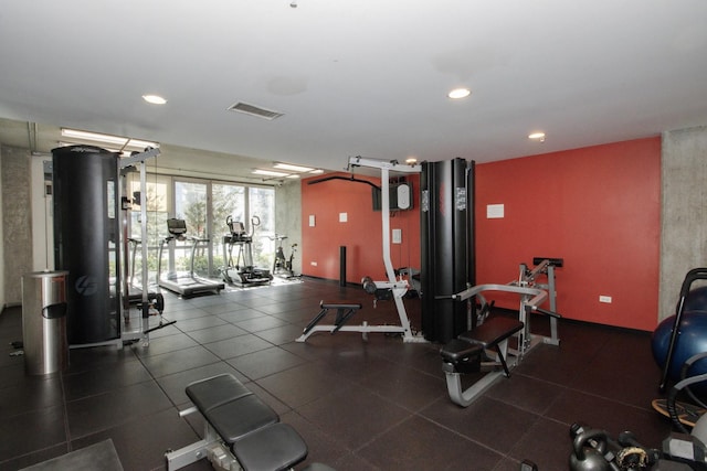 exercise room with recessed lighting