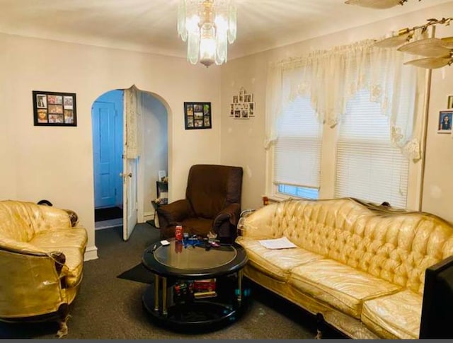4803 S Honore St, Chicago, IL 60609 - living area featuring arched walkways and carpet flooring
