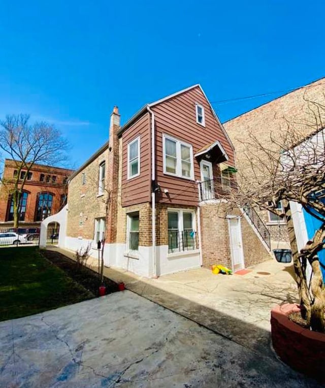 4803 S Honore St, Chicago, IL 60609 - view of front of home with a chimney