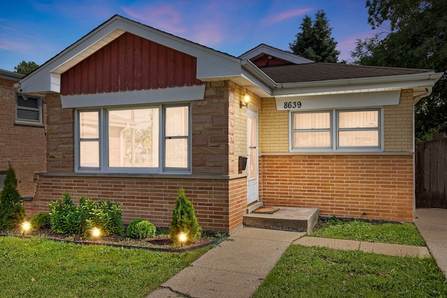 8639 Plainfield Rd, Lyons, IL 60534 - bungalow-style house with brick siding and board and batten siding