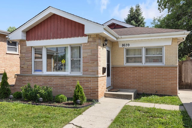 8639 Plainfield Rd, Lyons, IL 60534 - bungalow-style house featuring brick siding and roof with shingles