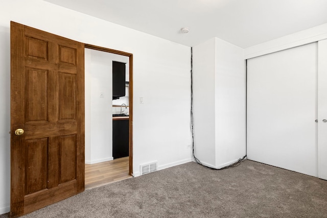 8639 Plainfield Rd, Lyons, IL 60534 - unfurnished bedroom with light colored carpet and a closet