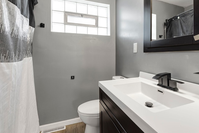 8639 Plainfield Rd, Lyons, IL 60534 - bathroom with vanity, wood finished floors, and a shower with curtain