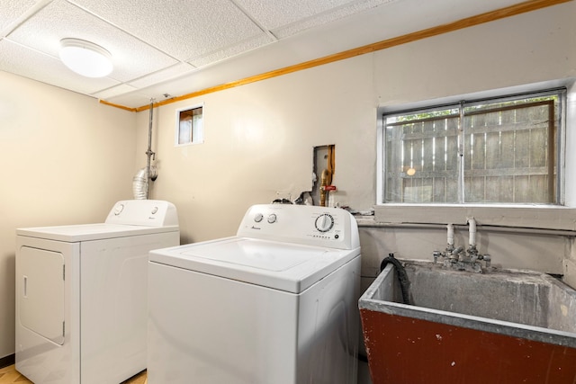 8639 Plainfield Rd, Lyons, IL 60534 - laundry room with washing machine and clothes dryer and plenty of natural light