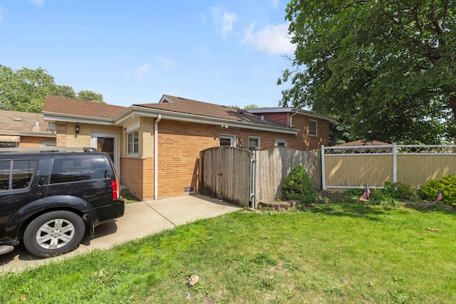 8639 Plainfield Rd, Lyons, IL 60534 - back of property featuring brick siding and a gate