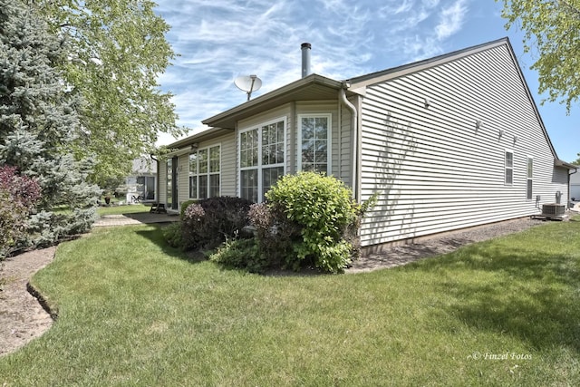 11315 Nelson Dr, Huntley, IL 60142 - view of side of home with a yard and central AC unit