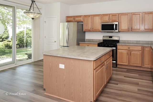 11315 Nelson Dr, Huntley, IL 60142 - kitchen with appliances with stainless steel finishes, wood finished floors, light countertops, and a center island