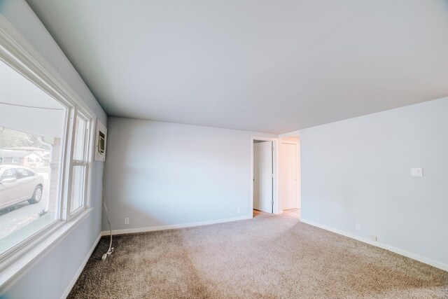 302 E Cherry St Unit B, Watseka, IL 60970 - unfurnished room featuring light colored carpet and baseboards