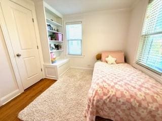 1010 N Patton Ave, Arlington Heights, IL 60004 - bedroom featuring dark wood-style floors, multiple windows, and baseboards