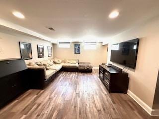 1010 N Patton Ave, Arlington Heights, IL 60004 - living area featuring baseboards, wood finished floors, and recessed lighting