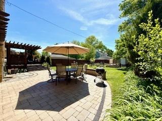 1010 N Patton Ave, Arlington Heights, IL 60004 - view of patio / terrace with a pergola and outdoor dining area