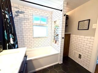 1010 N Patton Ave, Arlington Heights, IL 60004 - full bathroom featuring vanity, shower / tub combo, and tile patterned flooring