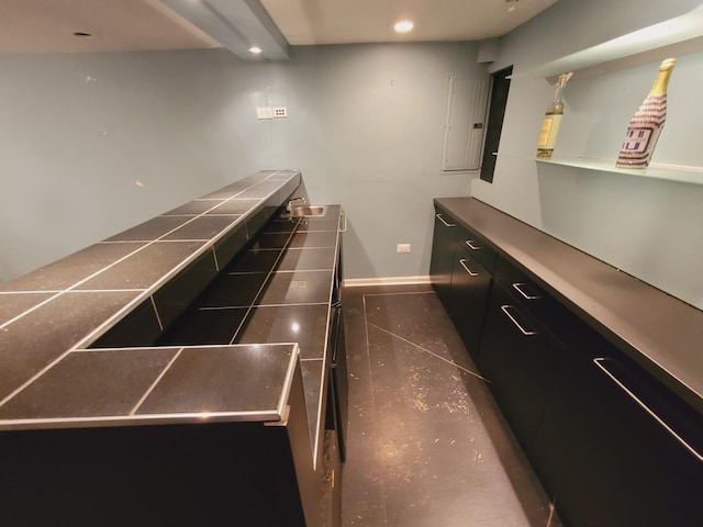 511 N Berwick Blvd, Waukegan, IL 60085 - misc room with baseboards, recessed lighting, and electric panel