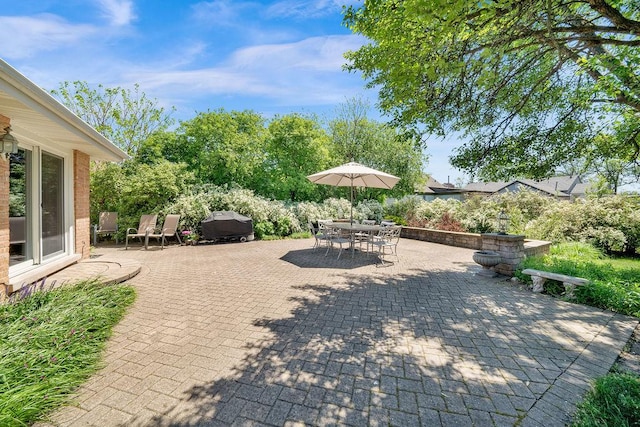 view of patio featuring outdoor dining space