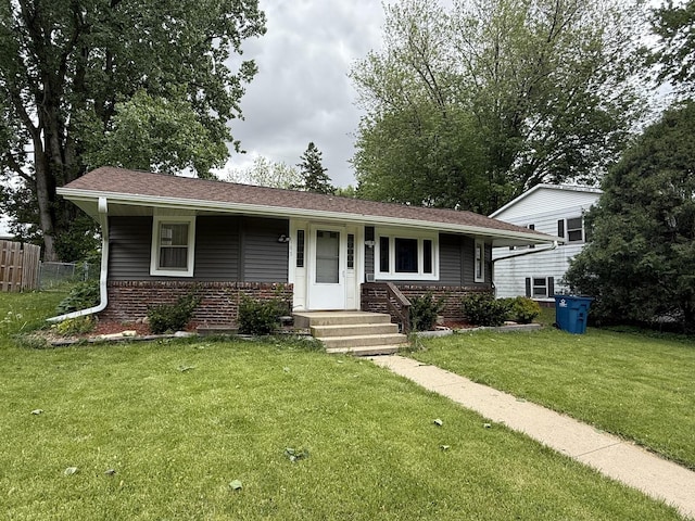 165 N Mill St, Cedarville, IL 61013 - view of front of house featuring brick siding and a porch