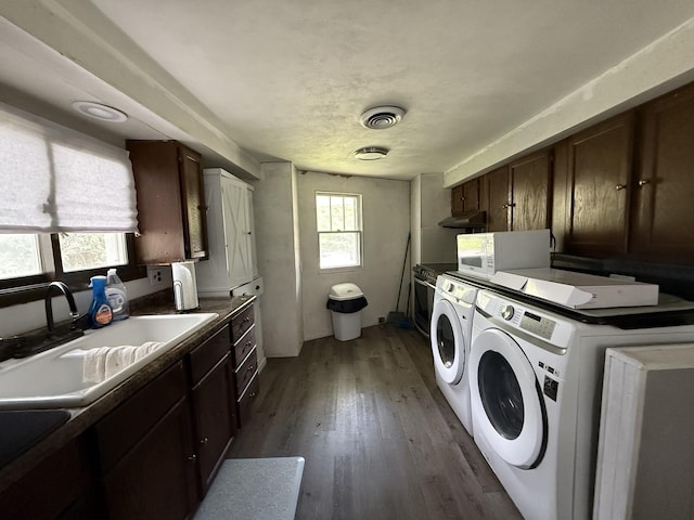 165 N Mill St, Cedarville, IL 61013 - laundry room with independent washer and dryer, wood finished floors, and a sink