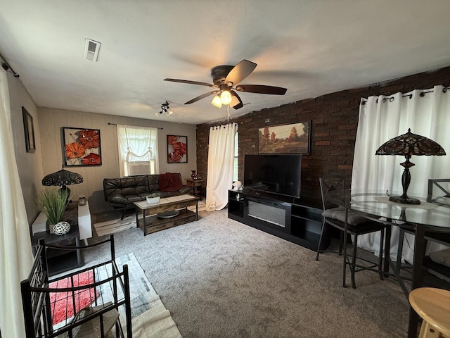 165 N Mill St, Cedarville, IL 61013 - living area with carpet flooring and ceiling fan