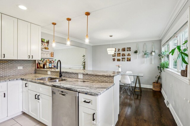9017 Pottawattami Dr, Skokie, IL 60076 - kitchen with dishwasher, a sink, a peninsula, decorative backsplash, and open shelves