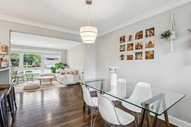 9017 Pottawattami Dr, Skokie, IL 60076 - dining area with ornamental molding, wood finished floors, and wainscoting