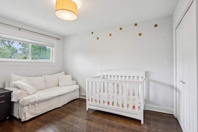 9017 Pottawattami Dr, Skokie, IL 60076 - bedroom with a closet, wood finished floors, and baseboards