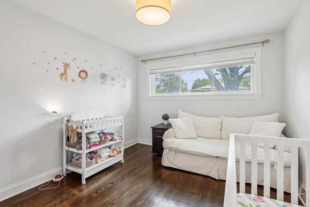 9017 Pottawattami Dr, Skokie, IL 60076 - bedroom with wood finished floors and baseboards