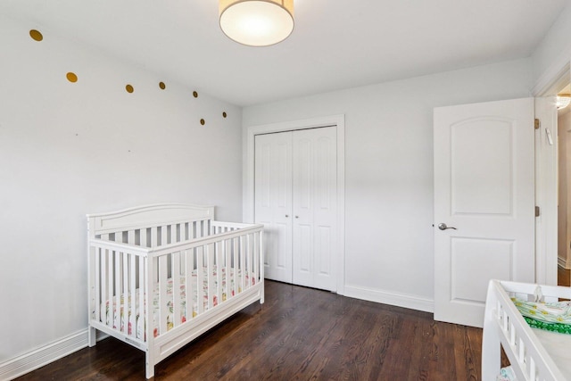 9017 Pottawattami Dr, Skokie, IL 60076 - bedroom featuring dark wood-style flooring, a closet, and baseboards