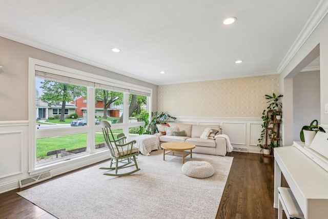 9017 Pottawattami Dr, Skokie, IL 60076 - living room featuring ornamental molding, a decorative wall, dark wood-type flooring, wallpapered walls, and a wainscoted wall