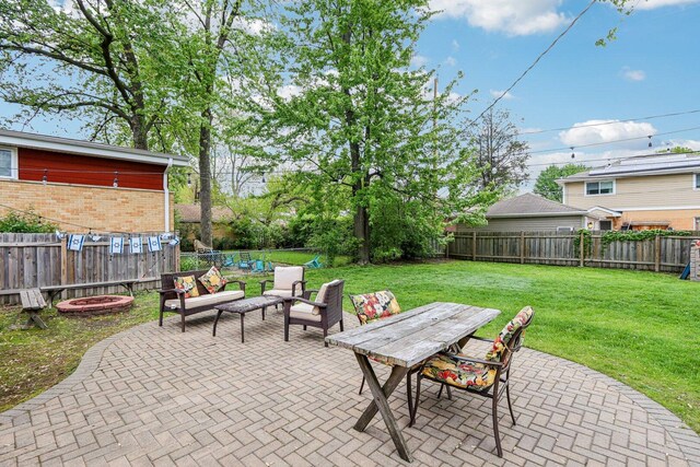 9017 Pottawattami Dr, Skokie, IL 60076 - view of patio with an outdoor living space with a fire pit