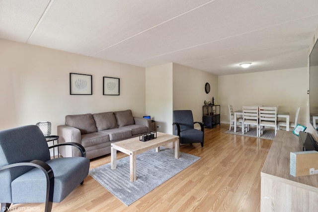 6980 W Touhy Ave Unit 201, Niles, IL 60714 - living area with light wood-type flooring