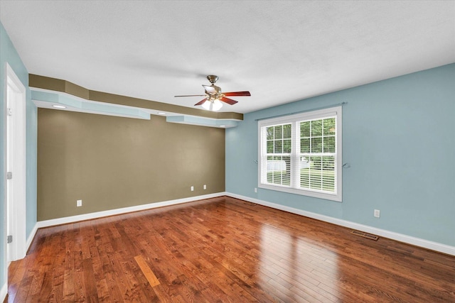 1208 Waters Edge Rd, Champaign, IL 61822 - empty room featuring wood finished floors and a ceiling fan