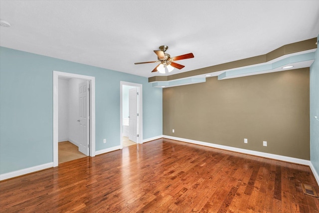 1208 Waters Edge Rd, Champaign, IL 61822 - empty room with ceiling fan and wood finished floors