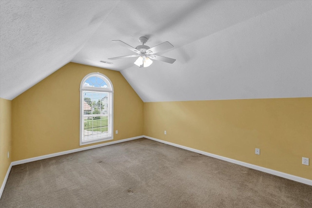 1208 Waters Edge Rd, Champaign, IL 61822 - bonus room with carpet, vaulted ceiling, and a ceiling fan