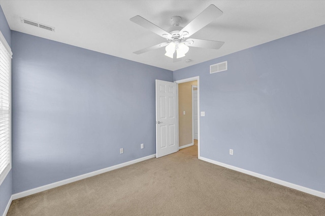 1208 Waters Edge Rd, Champaign, IL 61822 - unfurnished room with carpet floors and a ceiling fan