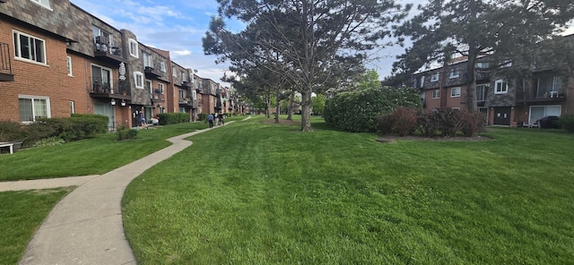 9356 Bay Colony Dr Unit 1S, Des Plaines, IL 60016 - surrounding community with a residential view and a lawn