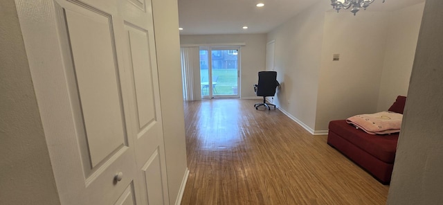 9356 Bay Colony Dr Unit 1S, Des Plaines, IL 60016 - hall with wood finished floors, baseboards, recessed lighting, and a chandelier