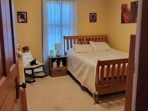 bedroom featuring carpet
