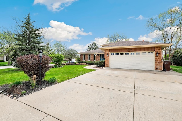 6333 Carriage Way, Oak Forest, IL 60452 - view of front facade featuring an attached garage, concrete driveway, a front yard, and brick siding