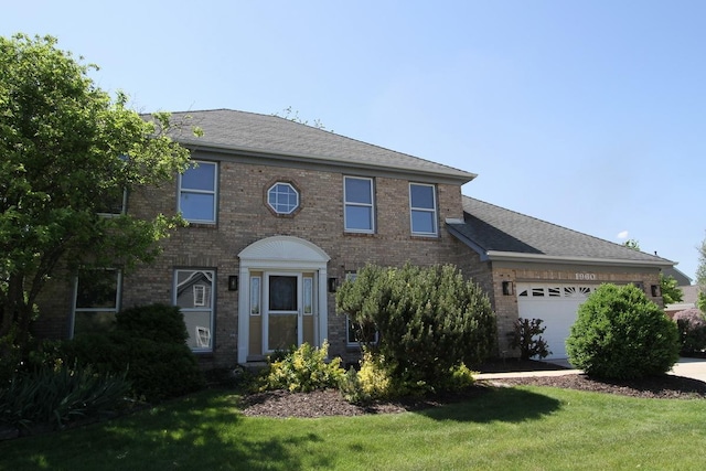1960 Slippery Rock Rd, Naperville, IL 60565 - colonial house with brick siding, a garage, a front yard, and roof with shingles