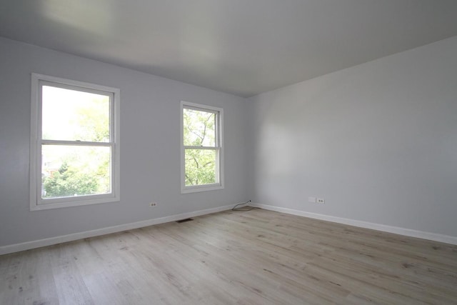 1960 Slippery Rock Rd, Naperville, IL 60565 - spare room featuring light wood-style flooring and baseboards
