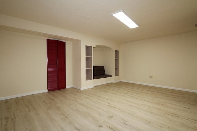 1960 Slippery Rock Rd, Naperville, IL 60565 - unfurnished living room featuring light wood finished floors and baseboards
