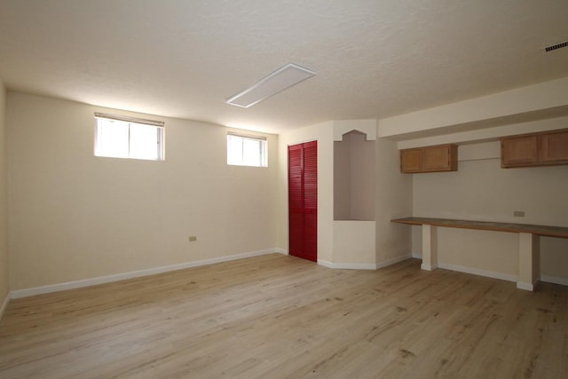 1960 Slippery Rock Rd, Naperville, IL 60565 - below grade area with light wood-type flooring and baseboards
